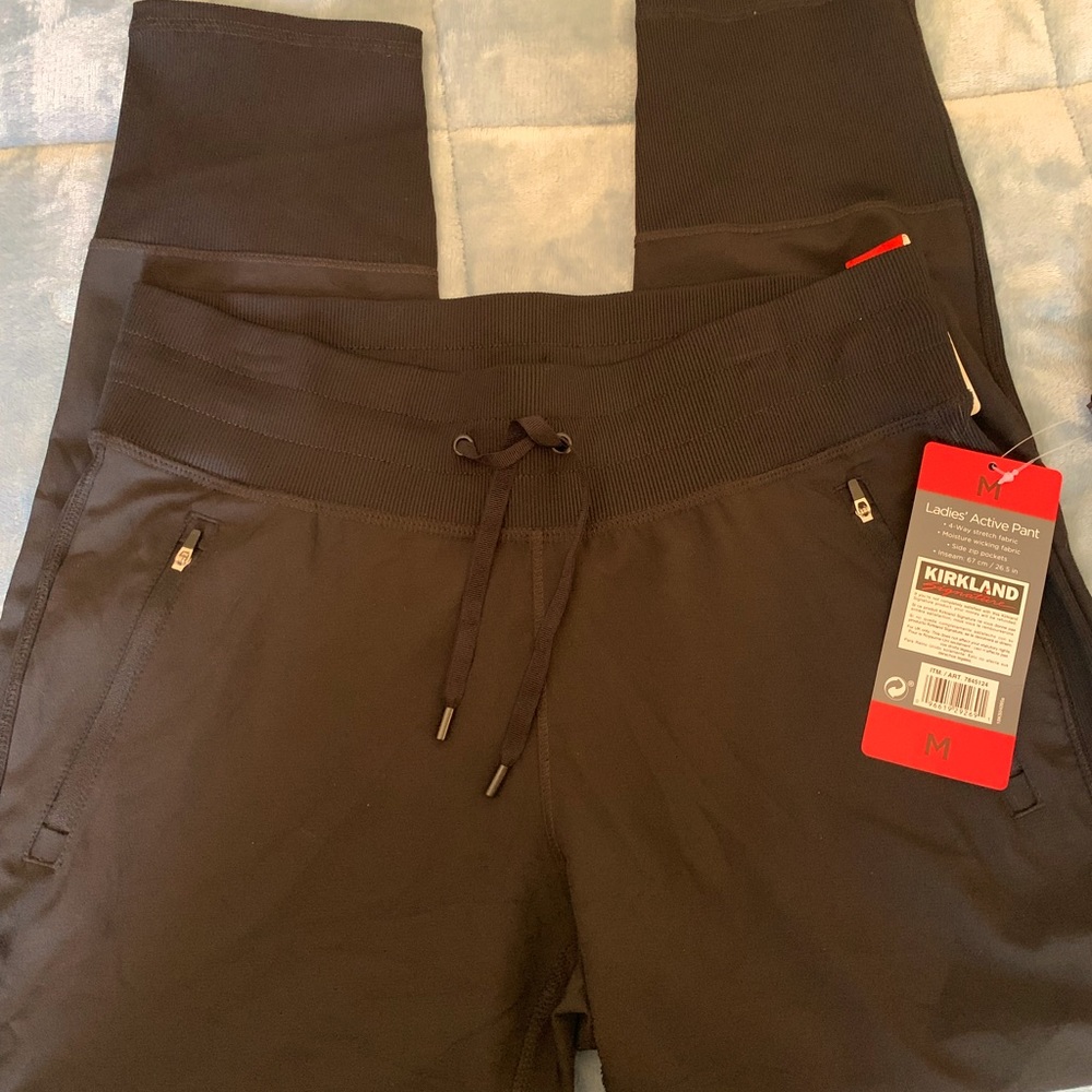 Kirkland black active pants, size M.